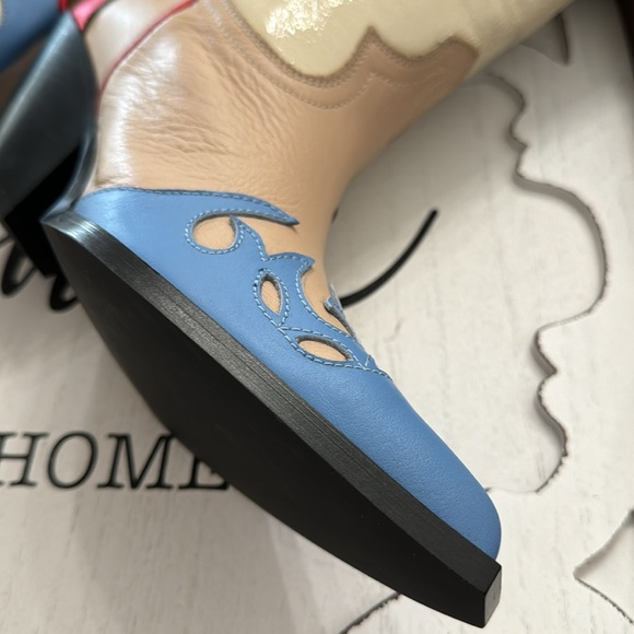 TORAL
Ships and sold by Linz Shop
Cowboy Boots In Multicolored - Picture 8 of 8